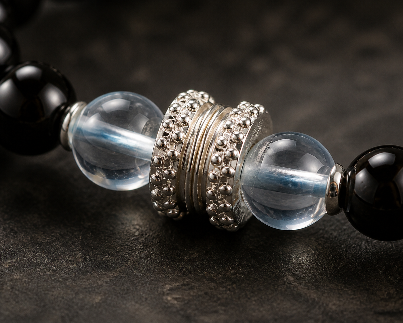 Black and blue quartz bracelet worn in a lifestyle setting