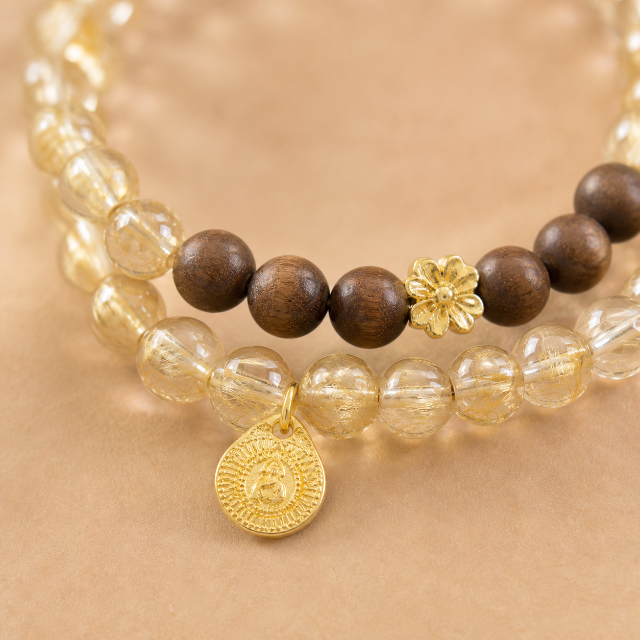 Citrine-tone crystal bracelet worn in a lifestyle setting