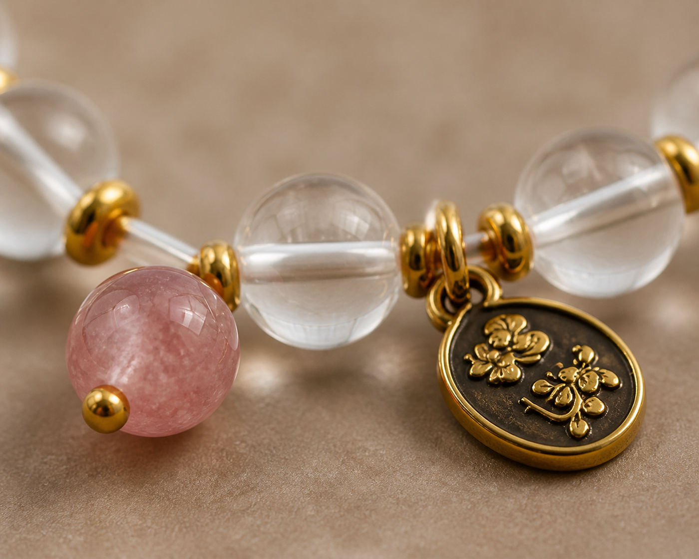 Strawberry quartz bracelet worn in a lifestyle setting