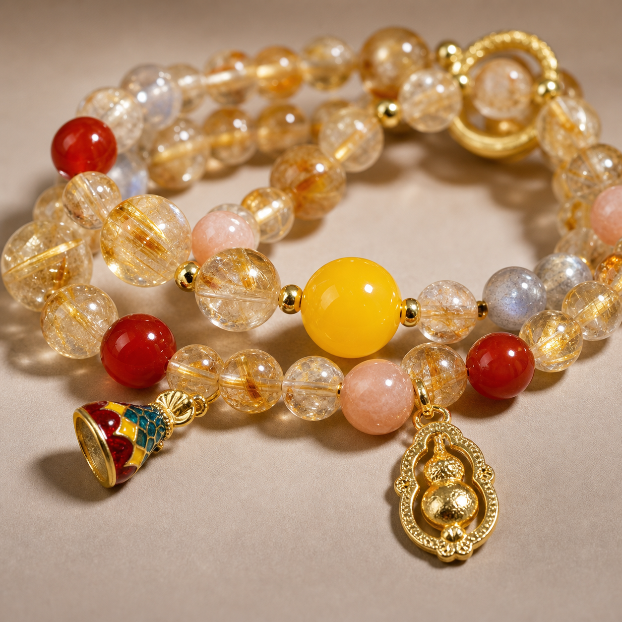 Citrine and rose quartz bracelet worn in a lifestyle setting